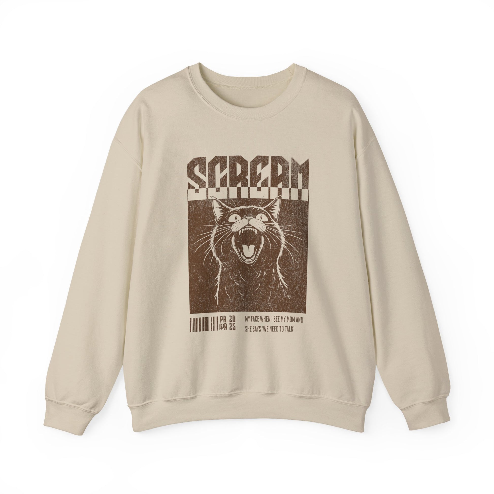 Beige sweatshirt with a graphic design of a cat and text on a white background