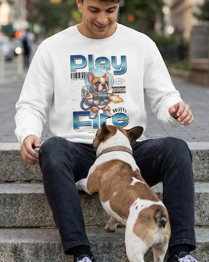 Man sitting on steps with a dog, wearing a sweatshirt with a graphic design for frenchie lovers.