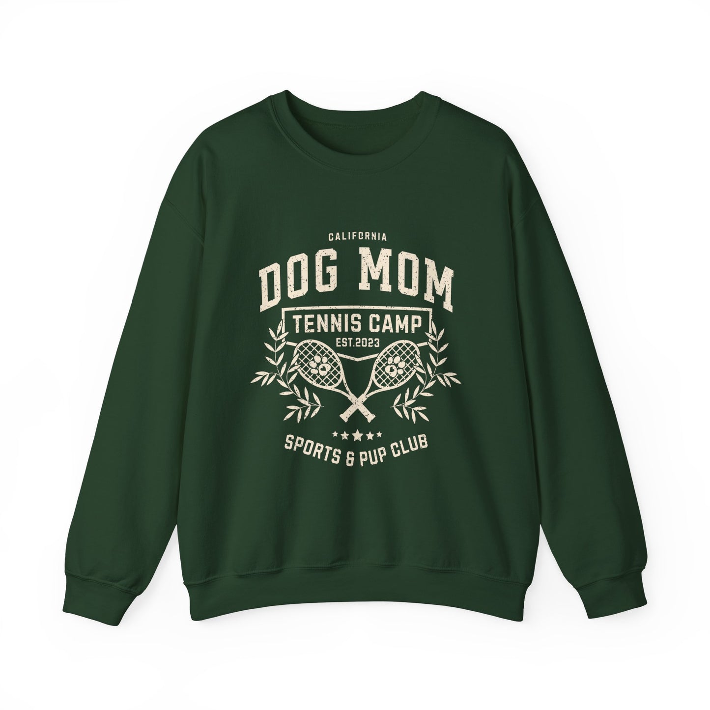 Green sweatshirt with 'Dog Mom Tennis Camp' text and graphics on a white background